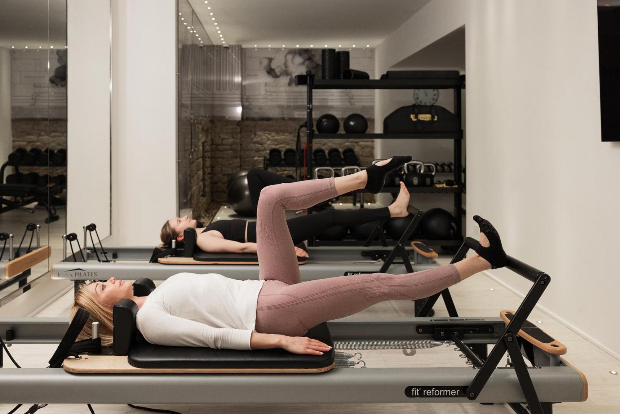 Helvetia&Bristol Firenze - Starhotels Collezione Εξωτερικό φωτογραφία A woman using a Pilates reformer